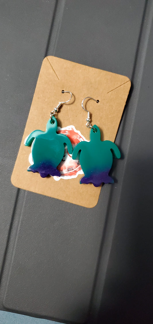 Turtle earrings (teal glow w/purple glow)