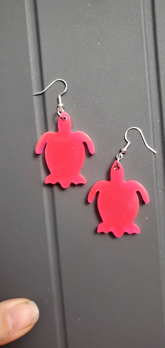Turtle earrings (pink glow)